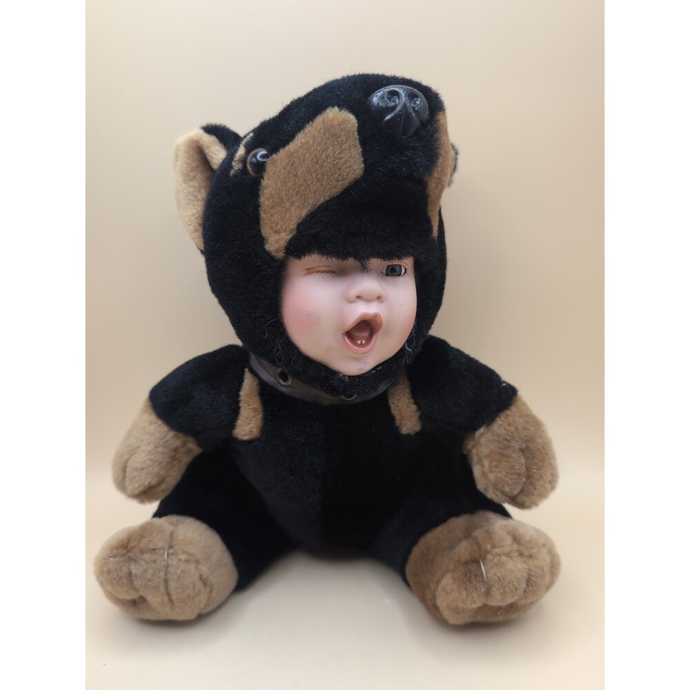 Show-Stoppers Babes in the Wild Baby Doll Porcelain Rottweiler Costume Winking